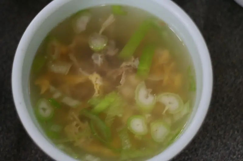 Bowl of bugeo-guk, clear dried pollack soup with radish and egg