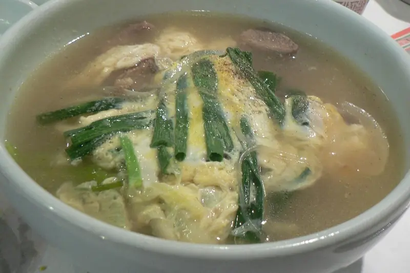 Galbitang beef short rib soup with glass noodles and egg garnish