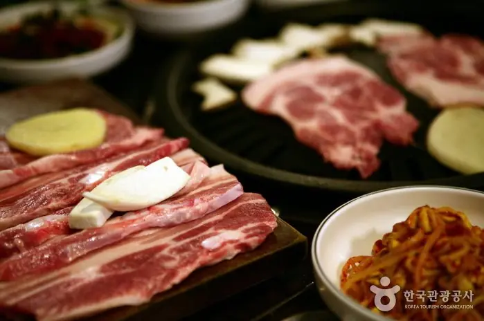 Black pork prepared for grilling at Dombedon