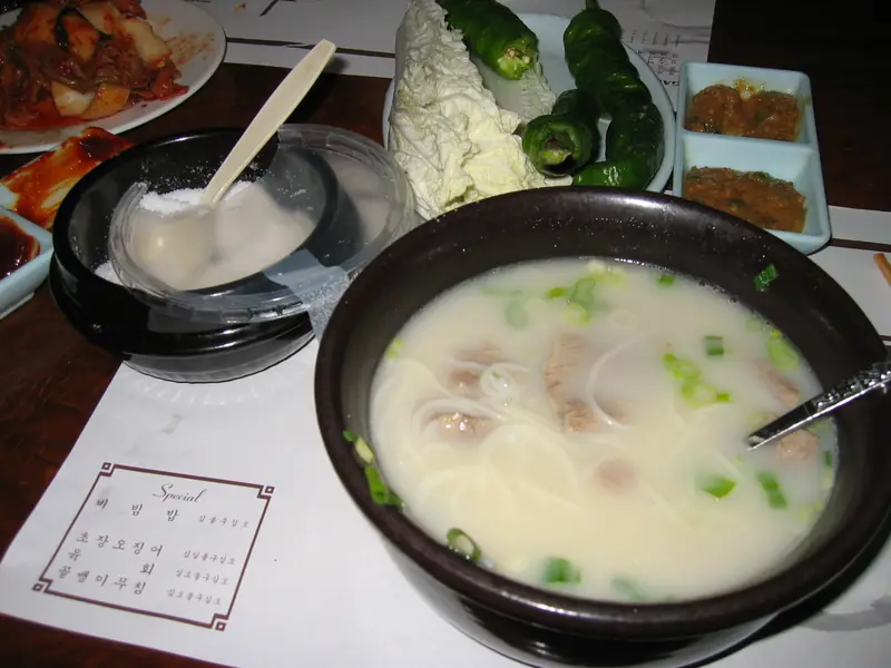 Milky ox bone soup with scallions
